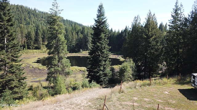 1959 Thimbleberry Ln, Sandpoint, ID 83864 - view of landscape with a water view and a forest view