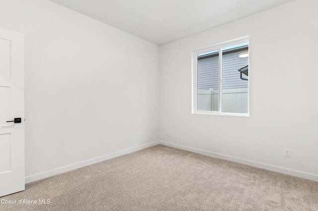 6696 Portrush Dr, Rathdrum, ID 83858 - carpeted empty room featuring baseboards