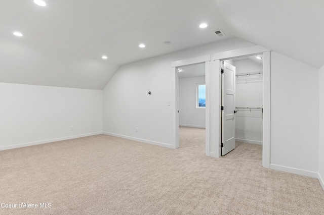 6696 Portrush Dr, Rathdrum, ID 83858 - additional living space featuring visible vents, light colored carpet, recessed lighting, and lofted ceiling
