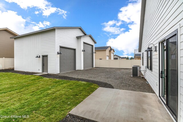 6696 Portrush Dr, Rathdrum, ID 83858 - exterior space with central air condition unit and fence
