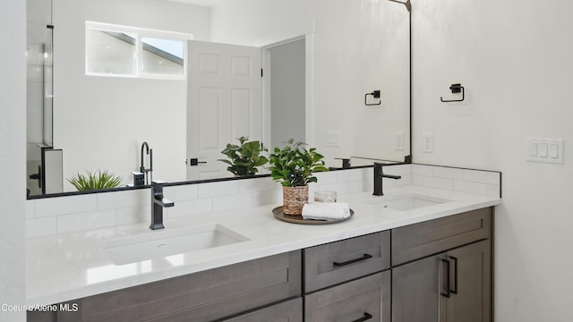 6696 Portrush Dr, Rathdrum, ID 83858 - full bath featuring double vanity and tasteful backsplash