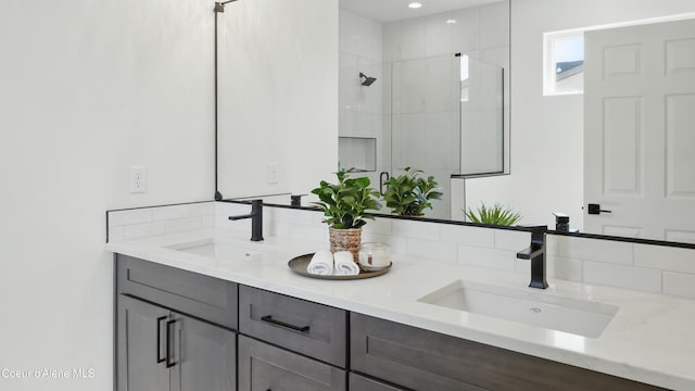 6696 Portrush Dr, Rathdrum, ID 83858 - full bath featuring decorative backsplash, double vanity, and a stall shower