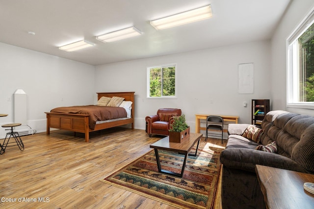 bedroom with light wood finished floors