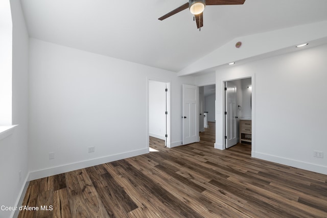 7435 N Cornwall St, Coeur Dalene, ID 83815 - unfurnished bedroom with lofted ceiling, dark wood-style flooring, and baseboards