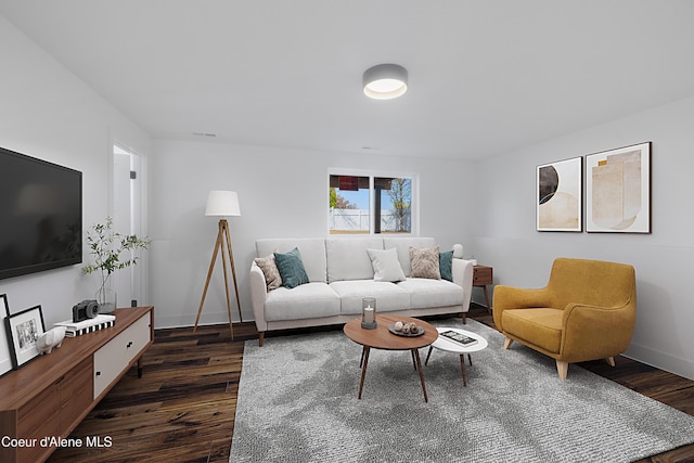 7435 N Cornwall St, Coeur Dalene, ID 83815 - living area featuring baseboards and dark wood finished floors