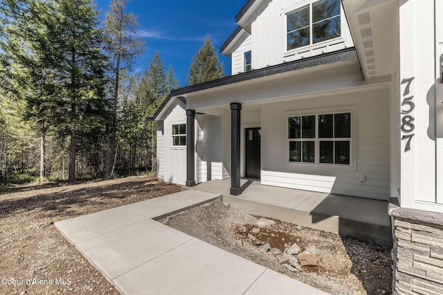 7587 E Duke Ln, Athol, ID 83801 - exterior space with a porch
