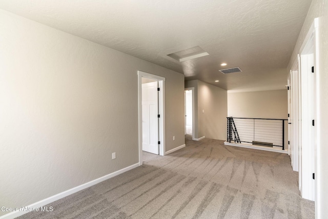 7587 E Duke Ln, Athol, ID 83801 - empty room with carpet flooring, recessed lighting, baseboards, and visible vents