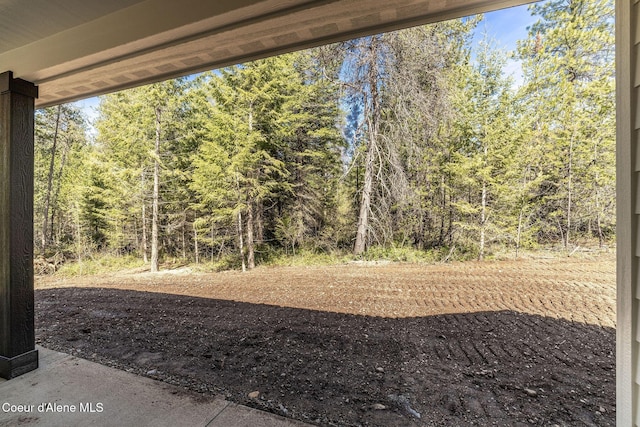 7587 E Duke Ln, Athol, ID 83801 - view of yard with a forest view