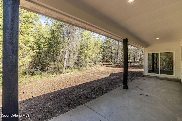 7587 E Duke Ln, Athol, ID 83801 - view of patio / terrace with a wooded view