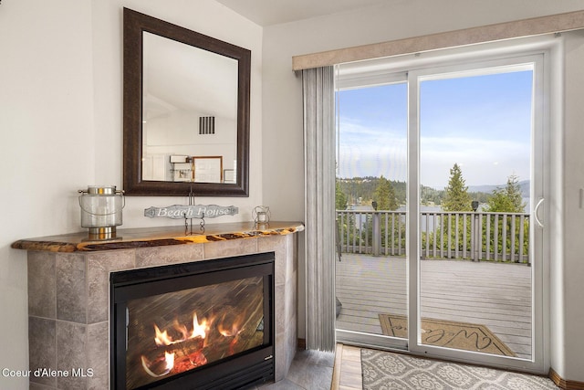 19820 S Alcan Rd, Coeur Dalene, ID 83814 - detailed view of a tiled fireplace