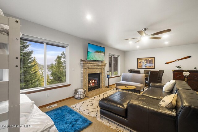 19820 S Alcan Rd, Coeur Dalene, ID 83814 - living area featuring ceiling fan, baseboards, a brick fireplace, and recessed lighting