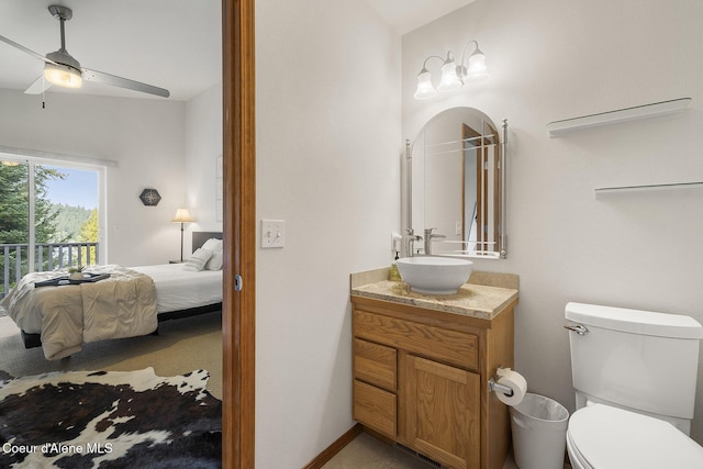 19820 S Alcan Rd, Coeur Dalene, ID 83814 - ensuite bathroom featuring a ceiling fan, toilet, and vanity