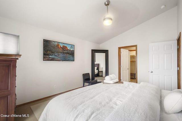 19820 S Alcan Rd, Coeur Dalene, ID 83814 - carpeted bedroom with vaulted ceiling, a spacious closet, baseboards, and a closet