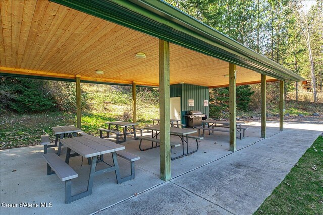 19820 S Alcan Rd, Coeur Dalene, ID 83814 - view of patio / terrace featuring outdoor dining area and grilling area