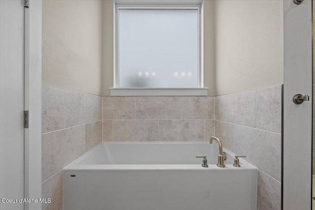 full bath with a bath
