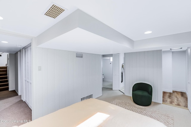 822 E Wallace Ave, Coeur Dalene, ID 83814 - finished below grade area with recessed lighting, carpet floors, stairs, and visible vents