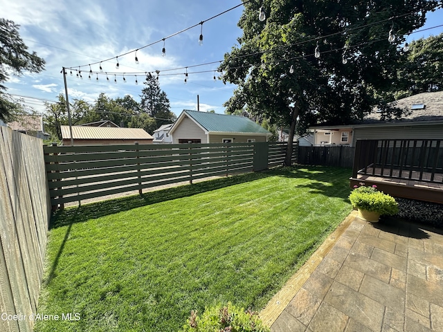 822 E Wallace Ave, Coeur Dalene, ID 83814 - view of yard featuring a fenced backyard, a patio area, and a wooden deck
