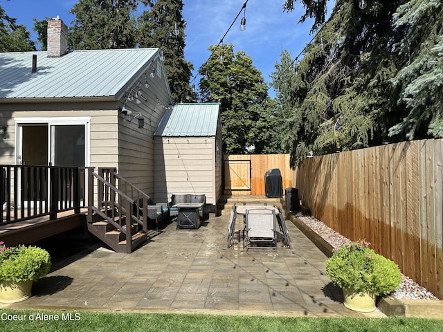 822 E Wallace Ave, Coeur Dalene, ID 83814 - view of patio with a fenced backyard, a gate, and a deck