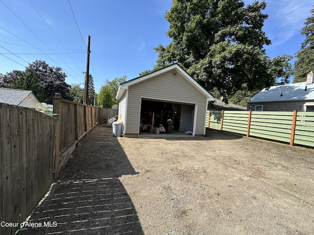 822 E Wallace Ave, Coeur Dalene, ID 83814 - detached garage featuring fence