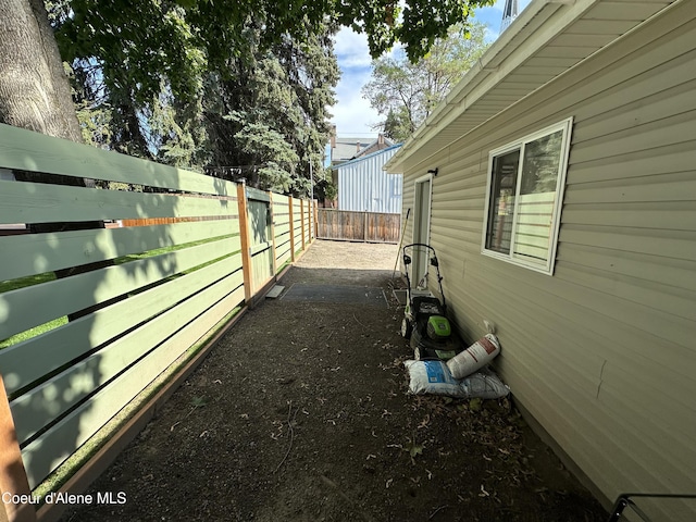 822 E Wallace Ave, Coeur Dalene, ID 83814 - view of side of home featuring a fenced backyard