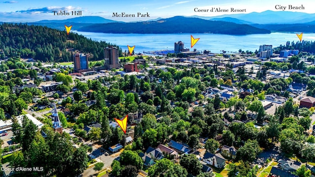 822 E Wallace Ave, Coeur Dalene, ID 83814 - drone / aerial view with a water and mountain view