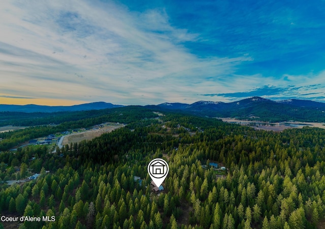 mountain view featuring a view of trees