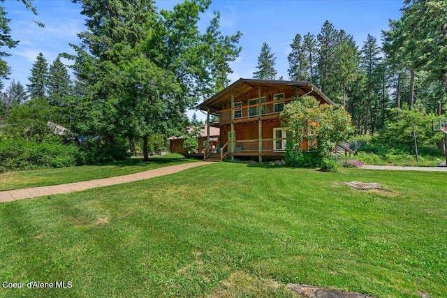 13168 N Clauson Trl, Rathdrum, ID 83858 - chalet / cabin featuring a front yard