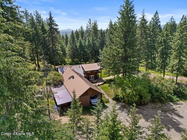 13168 N Clauson Trl, Rathdrum, ID 83858 - aerial view of property and surrounding area featuring a heavily wooded area