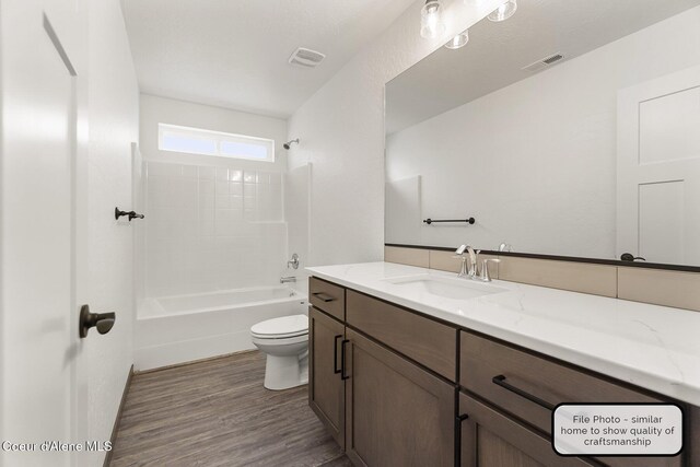LT7BLK1 E Valley St, Oldtown, ID 83822 - full bath featuring toilet, visible vents, wood finished floors, and vanity