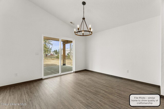 LT7BLK1 E Valley St, Oldtown, ID 83822 - unfurnished room with baseboards, wood finished floors, a notable chandelier, and high vaulted ceiling