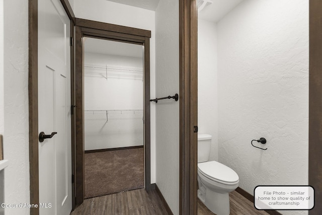 LT7BLK1 E Valley St, Oldtown, ID 83822 - bathroom with a textured wall, toilet, and wood finished floors