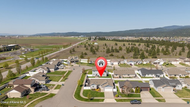 aerial view featuring a residential view and a mountain view