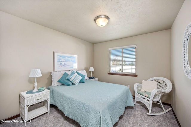 carpeted bedroom with baseboards