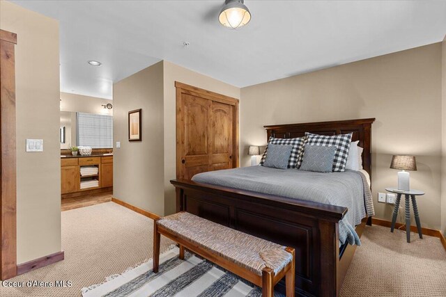 834 Mckinley Ave Unit 208, Kellogg, ID 83837 - bedroom with light carpet, baseboards, and a closet
