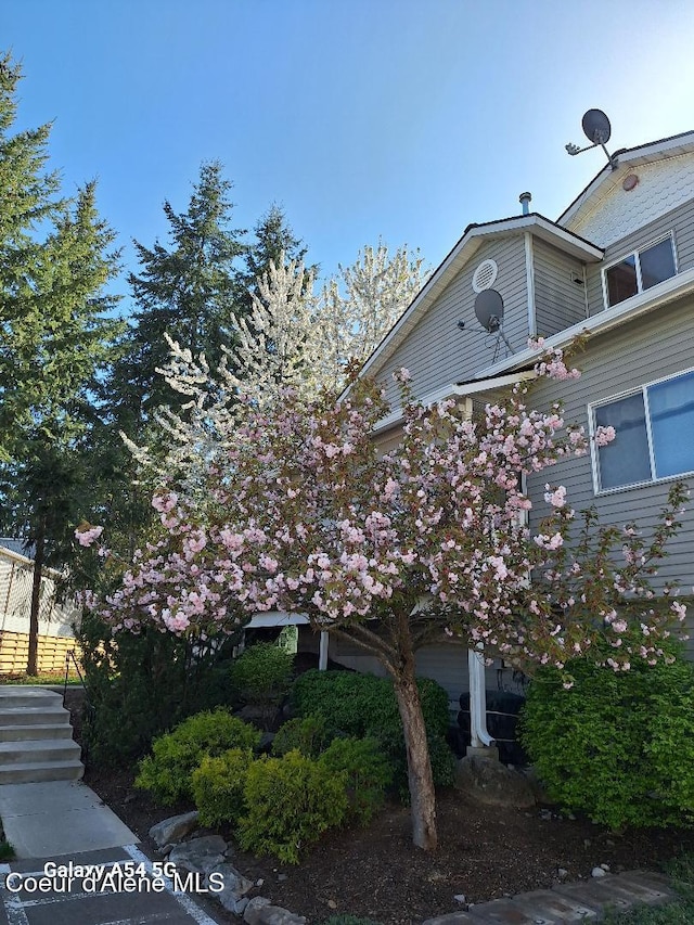 368 E Whispering Pines Ln # 6, Coeur Dalene, ID 83815 - view of home's exterior