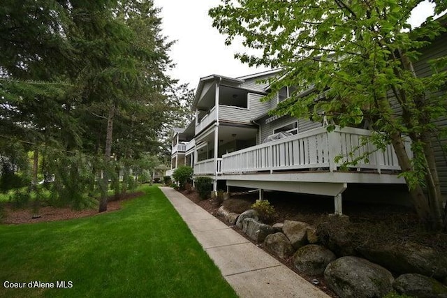 368 E Whispering Pines Ln # 6, Coeur Dalene, ID 83815 - exterior space featuring a yard and a deck