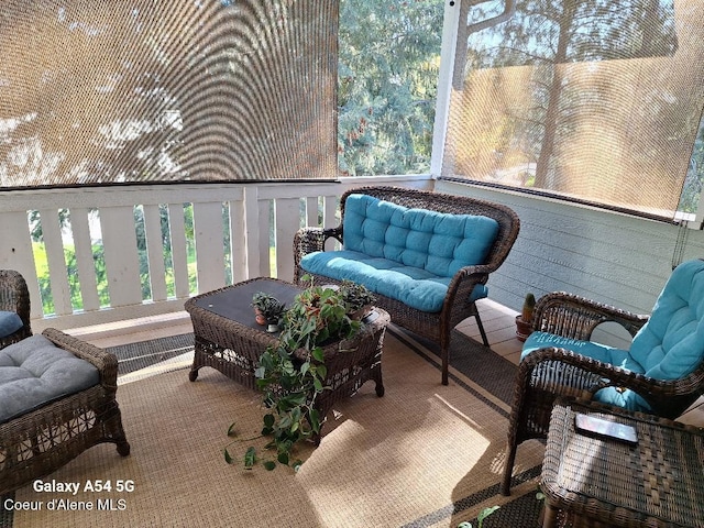 368 E Whispering Pines Ln # 6, Coeur Dalene, ID 83815 - sunroom with an outdoor living space