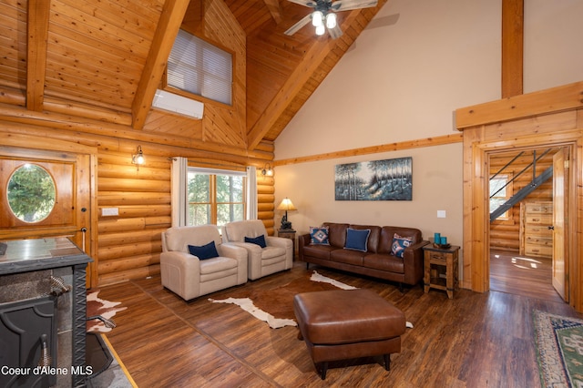 living area with wood finished floors, high vaulted ceiling, beamed ceiling, wooden ceiling, and rustic walls