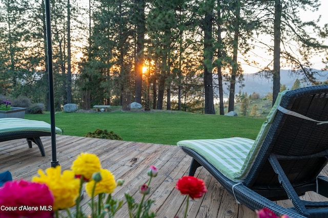 deck featuring a lawn