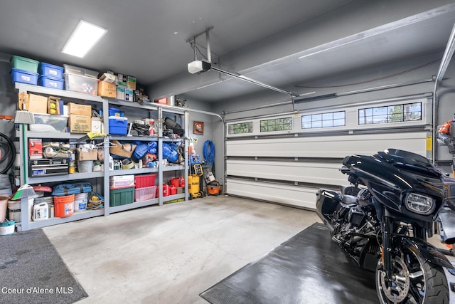 garage featuring a garage door opener