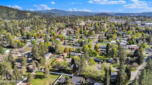 407 E Buttercup Ln, Coeur Dalene, ID 83815 - drone / aerial view with a residential view and a mountain view