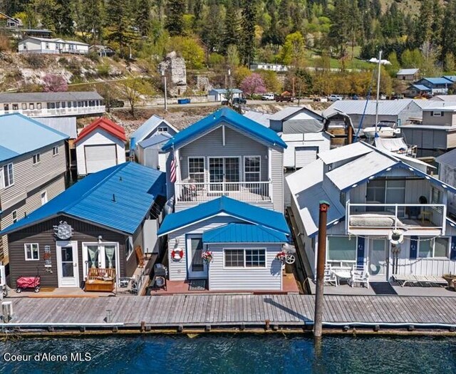 34128 N Scenic Bay D Dock Unit 21, Bayview, ID 83803 - back of house with a water view, french doors, and a residential view