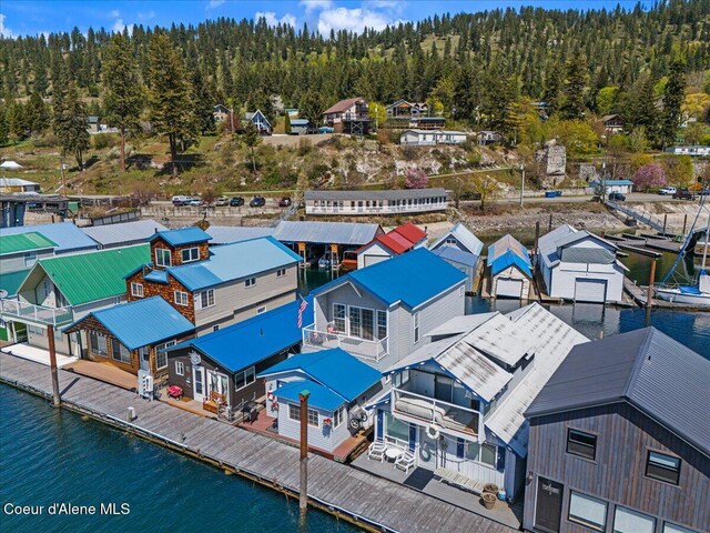 34128 N Scenic Bay D Dock Unit 21, Bayview, ID 83803 - birds eye view of property featuring a forest view and a water view
