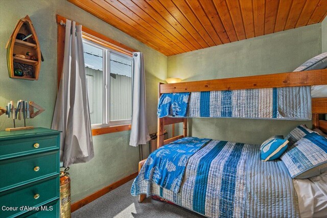 34128 N Scenic Bay D Dock Unit 21, Bayview, ID 83803 - bedroom with wood ceiling, a textured wall, and carpet