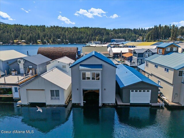 34128 N Scenic Bay D Dock Unit 21, Bayview, ID 83803 - view of front of home with a residential view, a water view, and a forest view