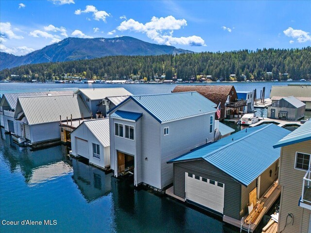 34128 N Scenic Bay D Dock Unit 21, Bayview, ID 83803 - aerial view with a view of trees and a water and mountain view