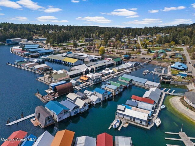 34128 N Scenic Bay D Dock Unit 21, Bayview, ID 83803 - drone / aerial view featuring a water view and a wooded view