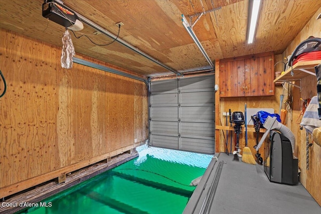 34128 N Scenic Bay D Dock Unit 21, Bayview, ID 83803 - garage featuring wood walls and wooden ceiling