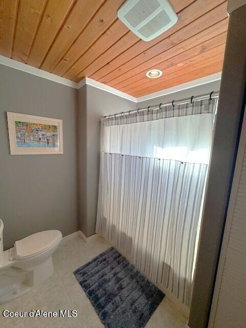34128 N Scenic Bay D Dock Unit 21, Bayview, ID 83803 - full bath featuring toilet, wooden ceiling, a shower with curtain, visible vents, and ornamental molding