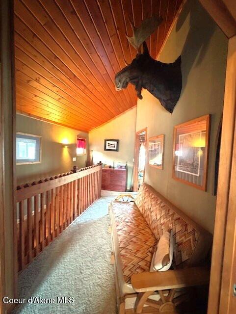 34128 N Scenic Bay D Dock Unit 21, Bayview, ID 83803 - additional living space featuring vaulted ceiling, wood ceiling, and carpet